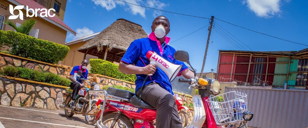 A boda boda driver prepares to deliver health awareness messages as part of the Ugandan Government’s “Megaphone Blitz Campaign”