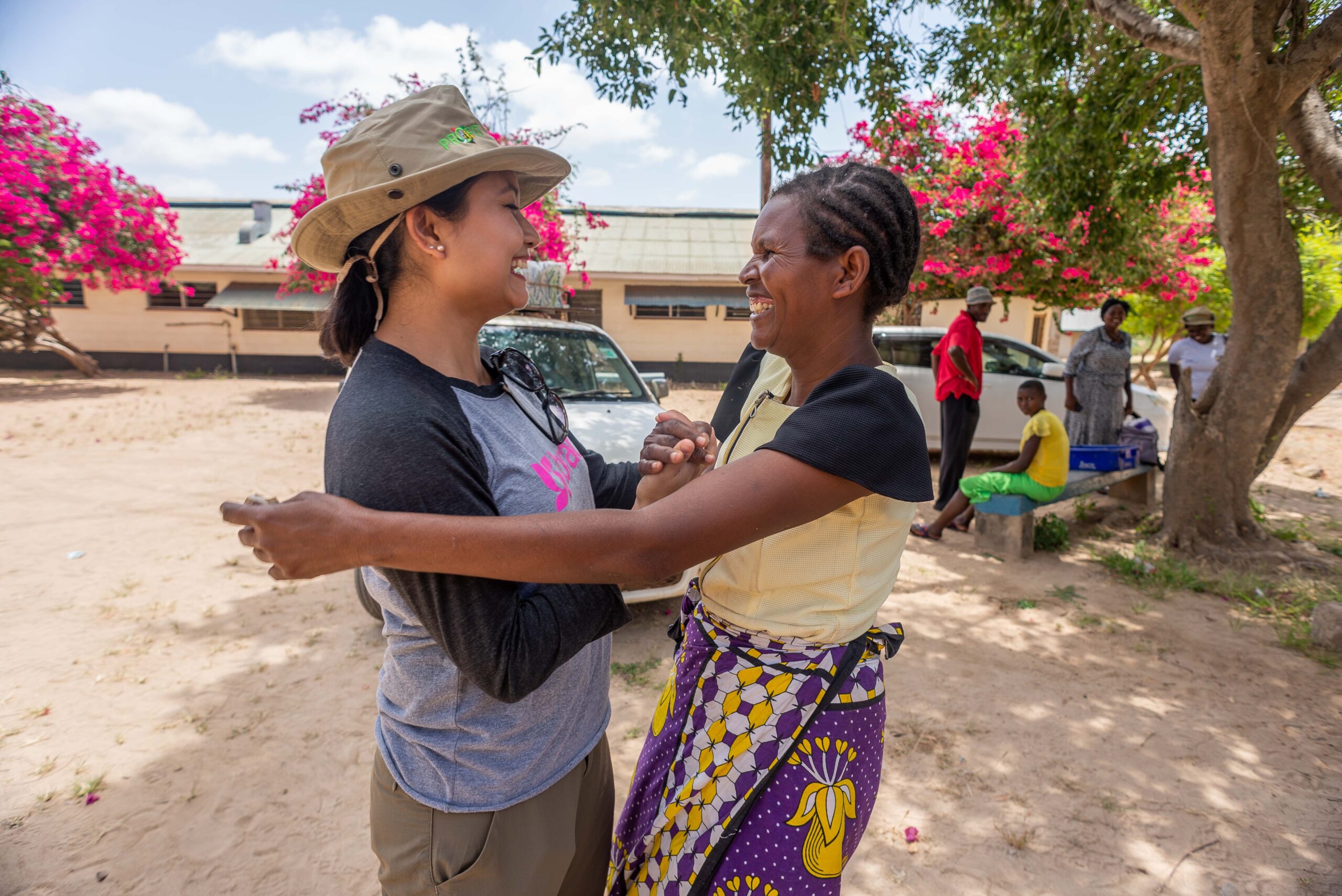 Two women greeting each other