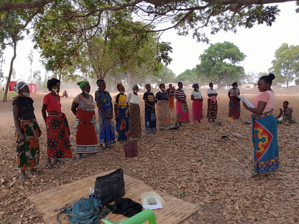 Woman leading an outdoor class in Zambia